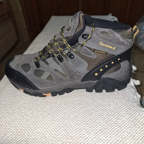 A pair of BearPaw grey hiking boots in a men's size 13. They're new without box.