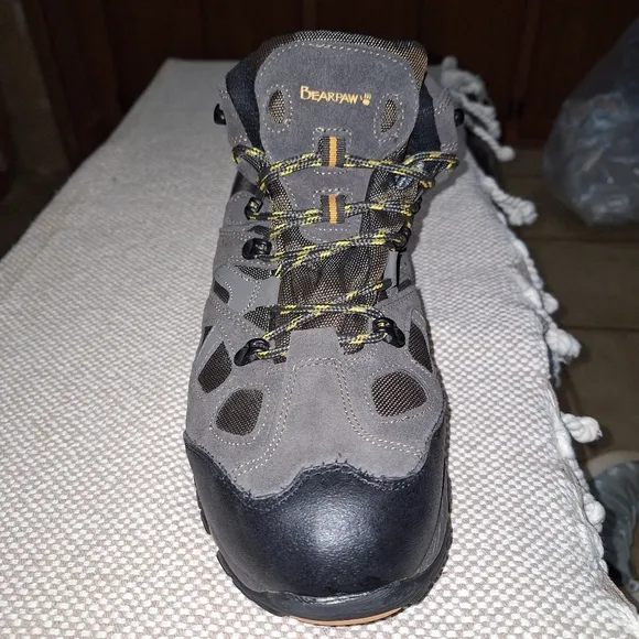 A pair of BearPaw grey hiking boots in a men's size 13. They're new without box.