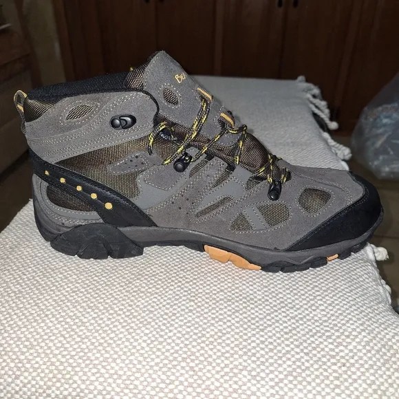 A pair of BearPaw grey hiking boots in a men's size 13. They're new without box.