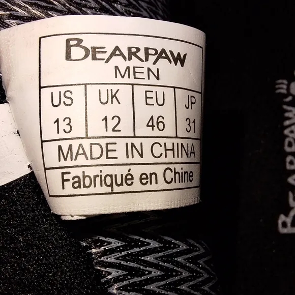 A pair of BearPaw grey hiking boots in a men's size 13. They're new without box.