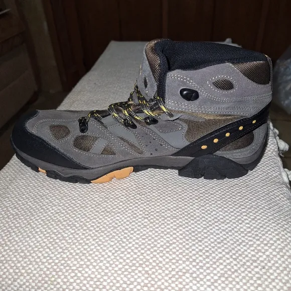 A pair of BearPaw grey hiking boots in a men's size 13. They're new without box.