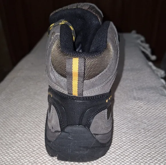 A pair of BearPaw grey hiking boots in a men's size 13. They're new without box.