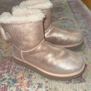 Big girls pink Ugg boots
