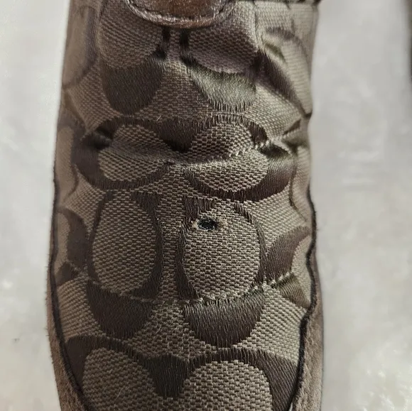 COACH brown swayed fur winter boots