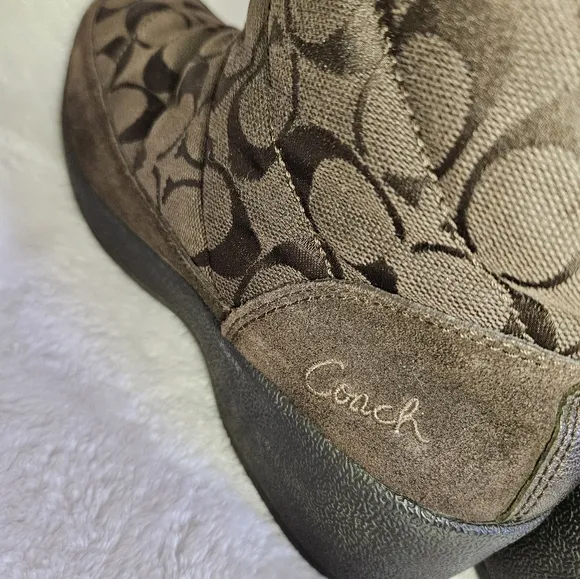 COACH brown swayed fur winter boots