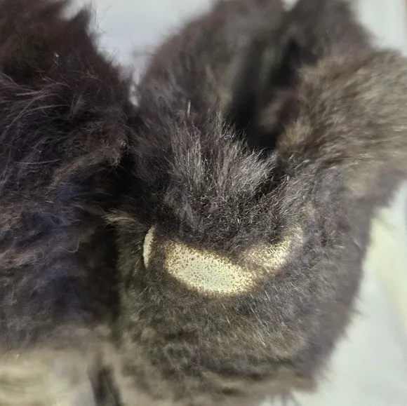 COACH brown swayed fur winter boots