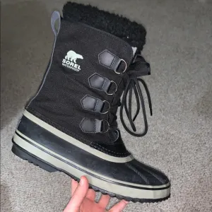 Sorel Black Rain and Snow Boots with Fur Lining and Rugged Sole