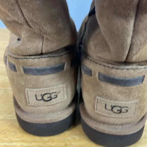 UGG knee high tan colored boots with fur around the top size 10