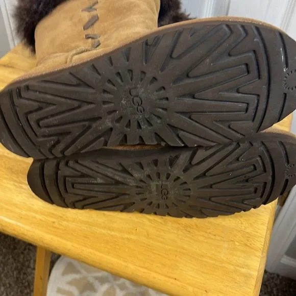 UGG knee high tan colored boots with fur around the top size 10