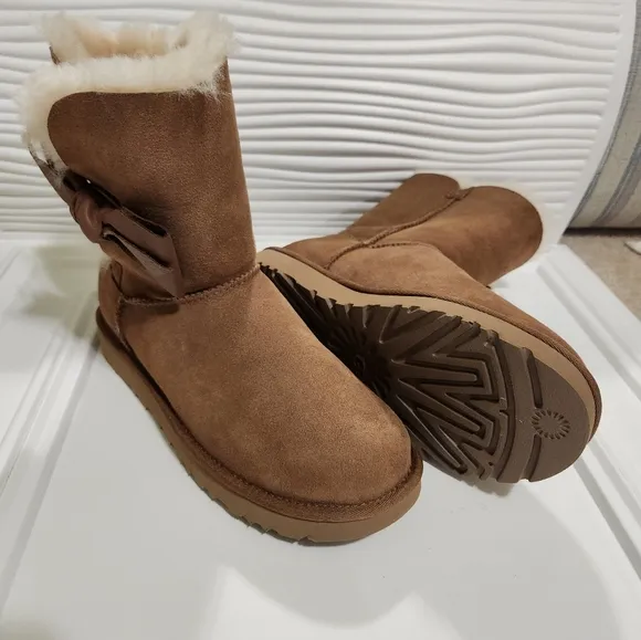 UGG leather bow on the size boots