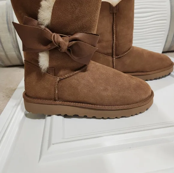 UGG leather bow on the size boots