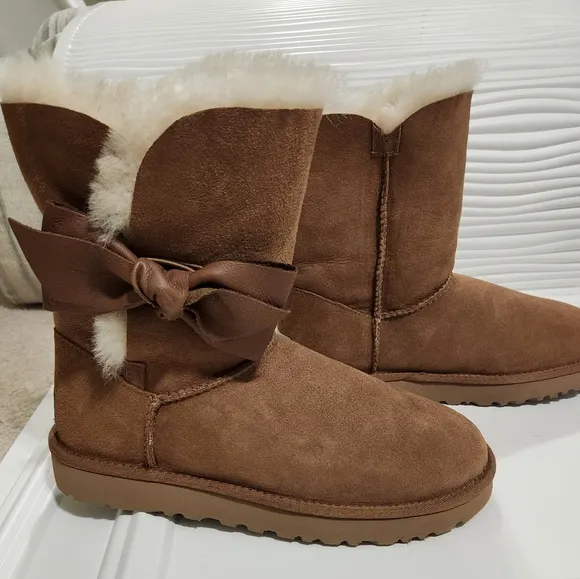 UGG leather bow on the size boots