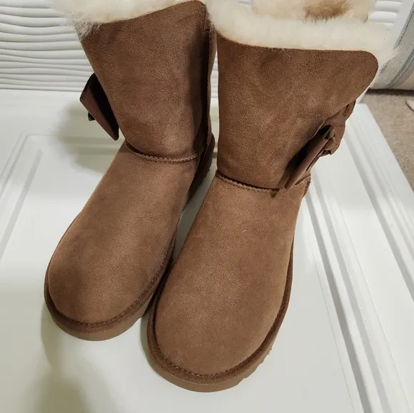 UGG leather bow on the size boots