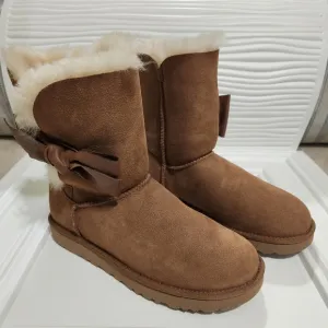 UGG leather bow on the size boots